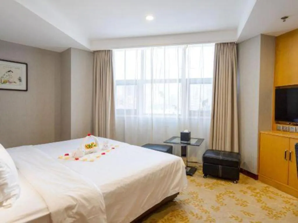 Bed in Xian Empress Hotel