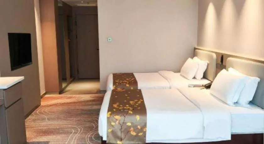 Bed in Xian Empress Hotel