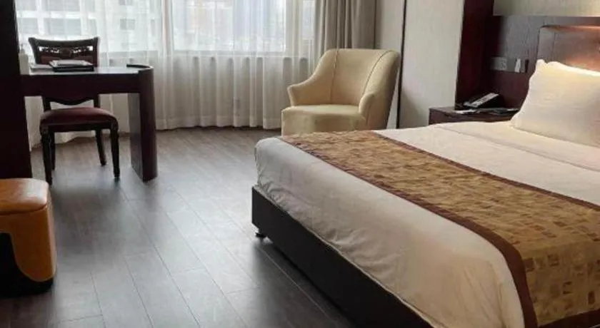 Bed in Xian Empress Hotel