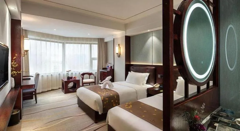 Bed in Xian Empress Hotel