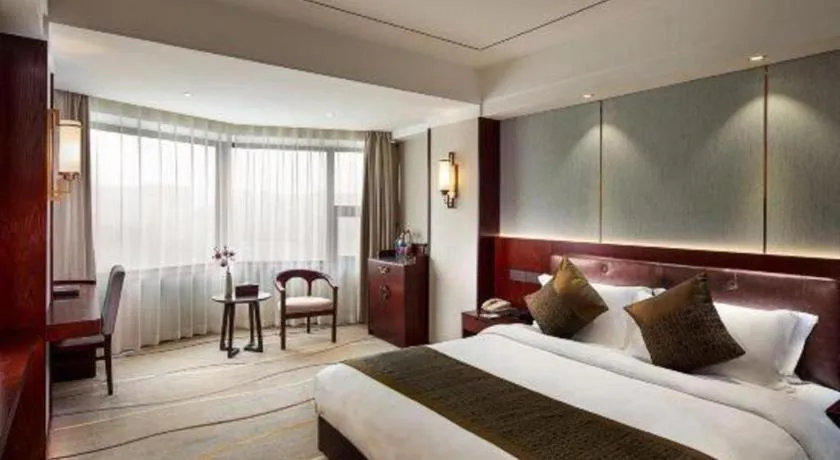 Bed in Xian Empress Hotel