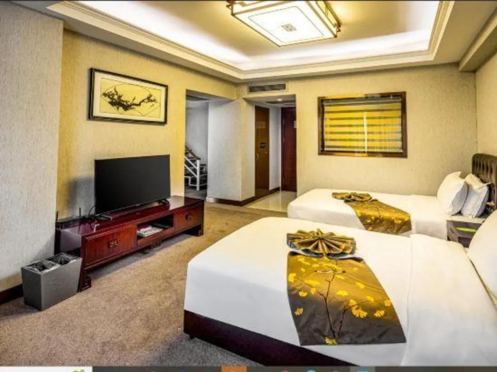 Bed in Xian Empress Hotel