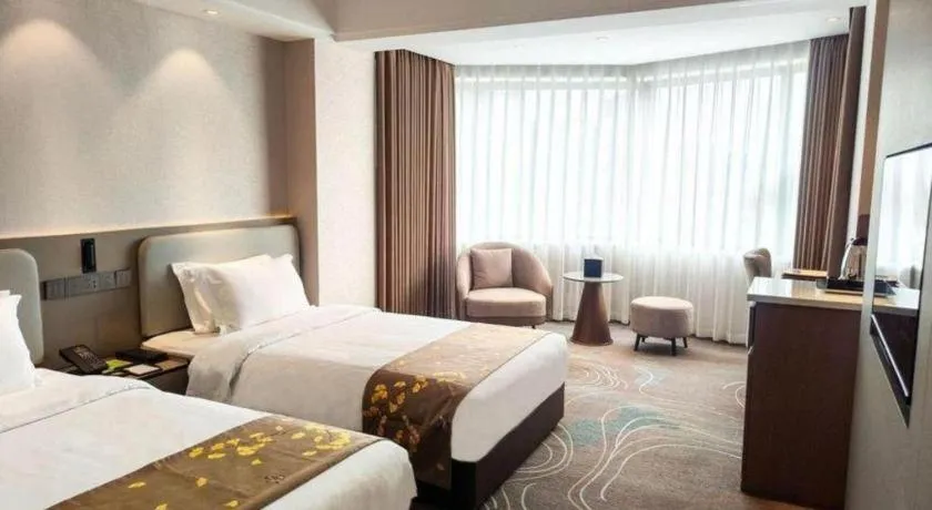 Bed in Xian Empress Hotel