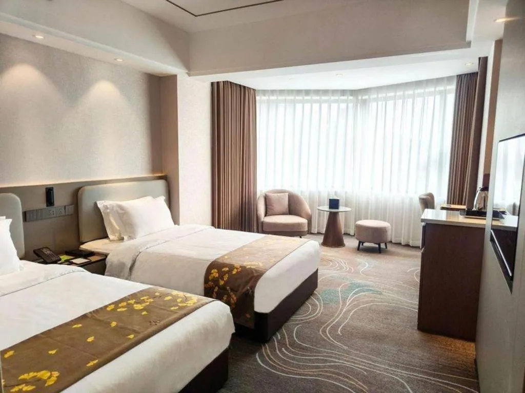 Bed in Xian Empress Hotel