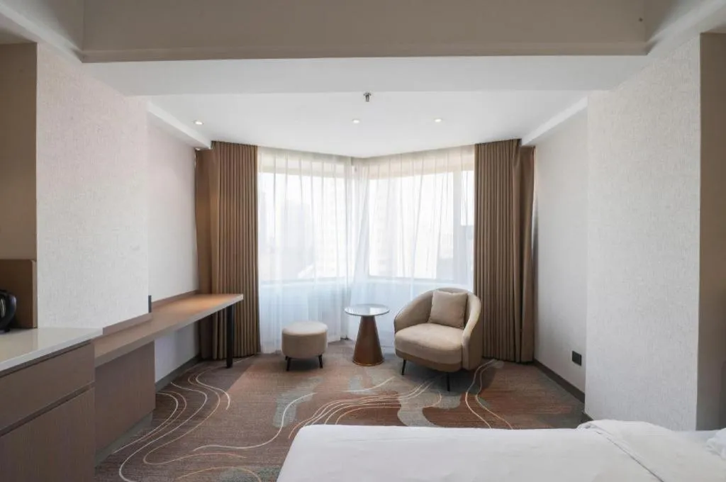 Bed in Xian Empress Hotel