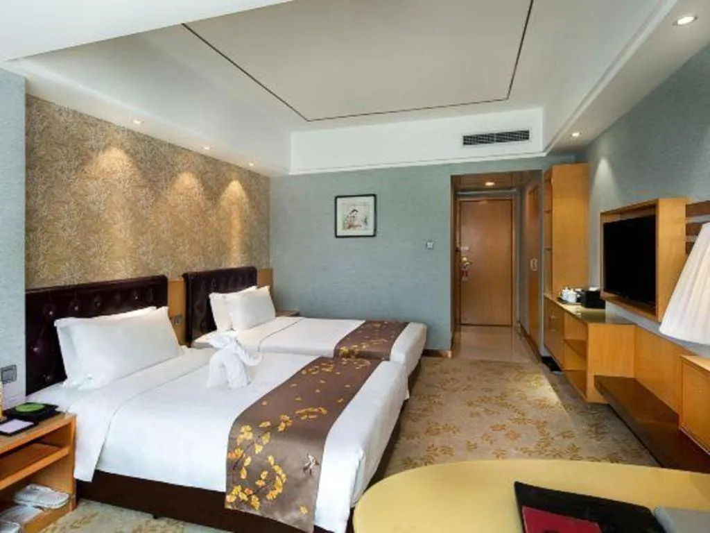 Bed in Xian Empress Hotel