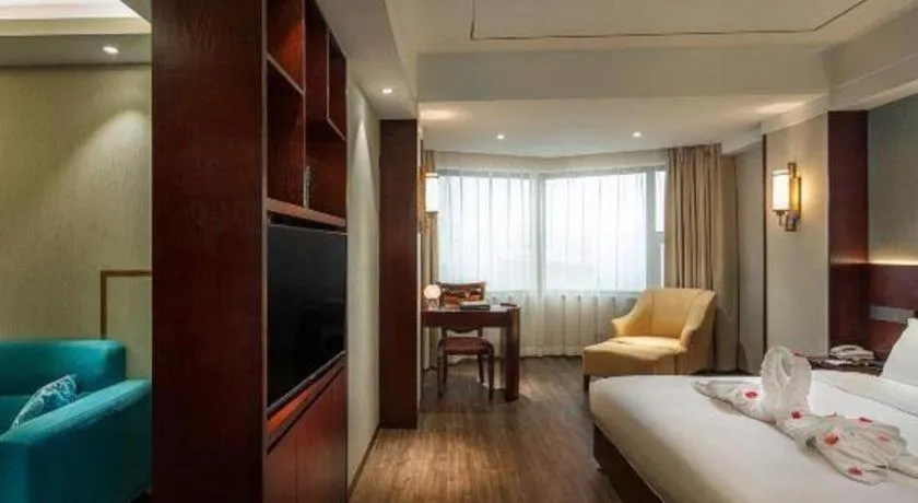 Bed in Xian Empress Hotel