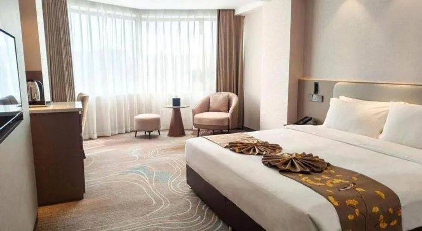 Bed in Xian Empress Hotel