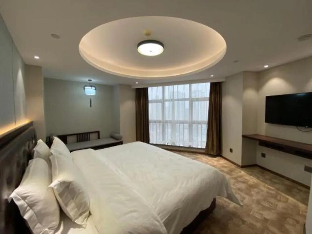 Bed in Xian Empress Hotel