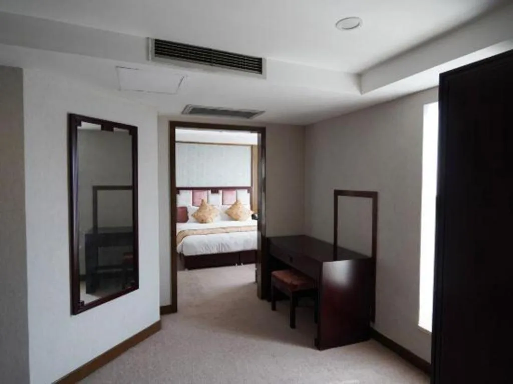 Bed in Xian Empress Hotel