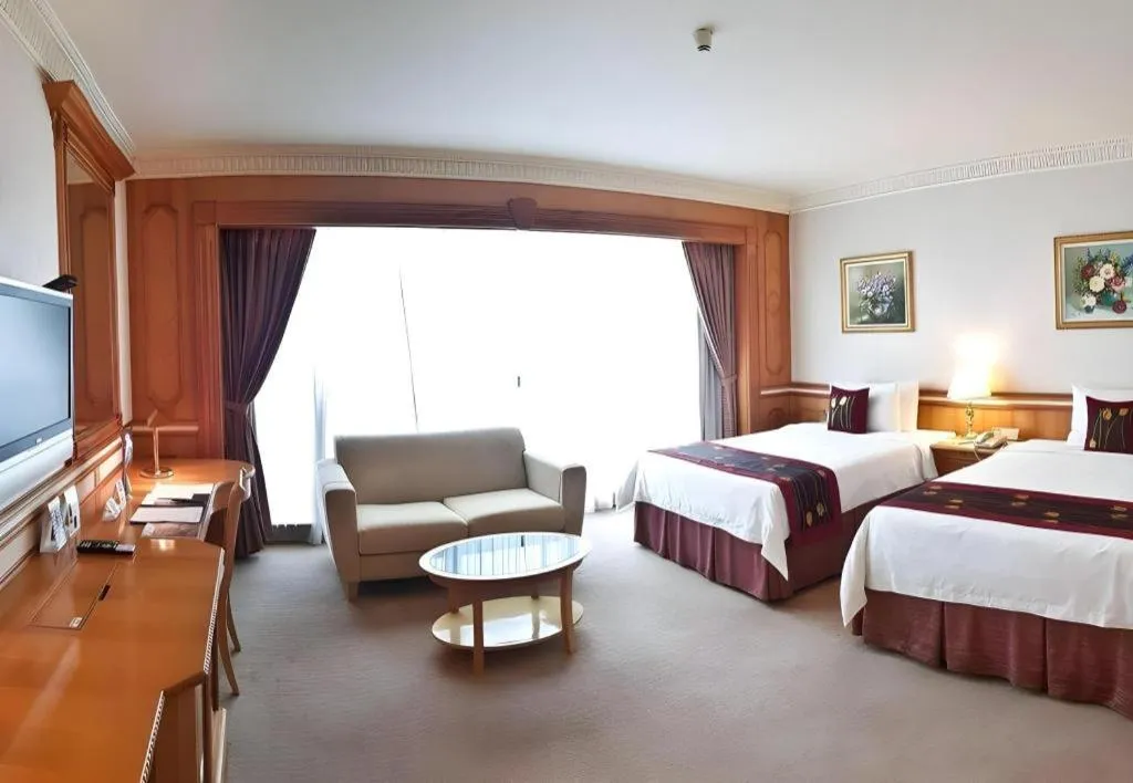 Bed in The Rizqun International Hotel