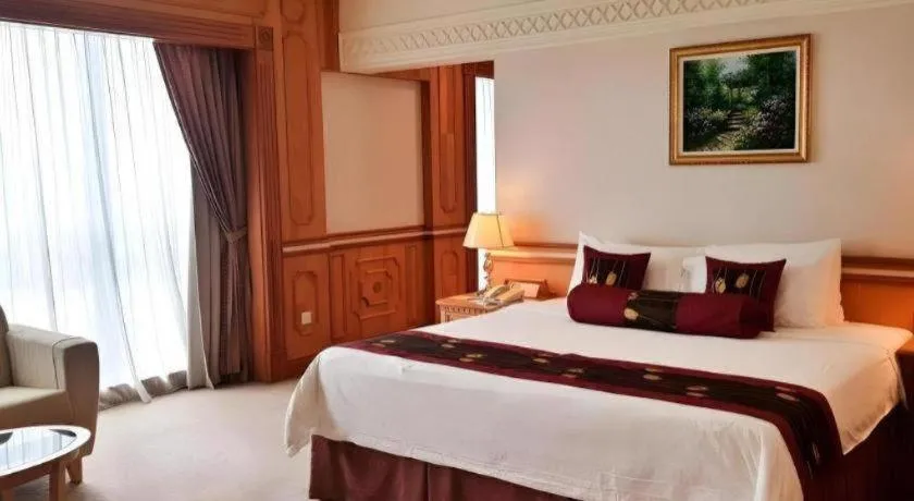 Bed in The Rizqun International Hotel