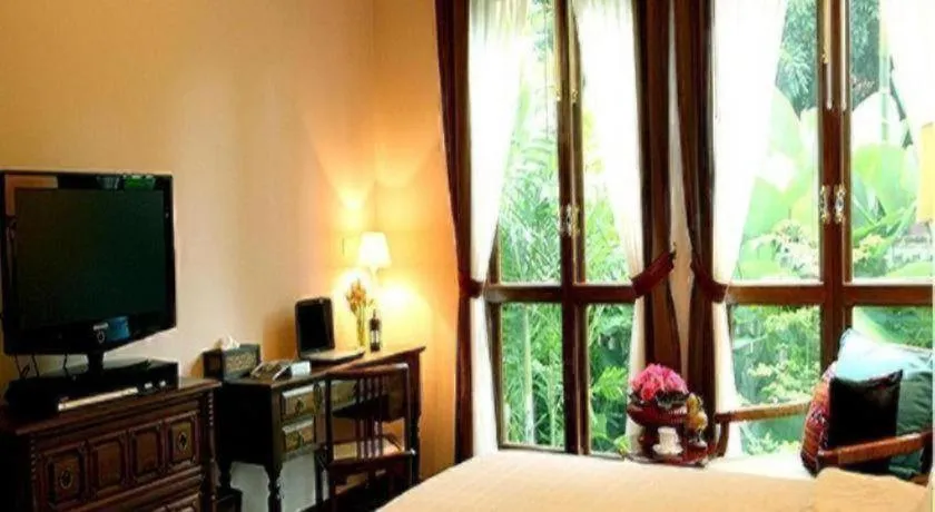 Bed in Baan Klang Wiang Hotel