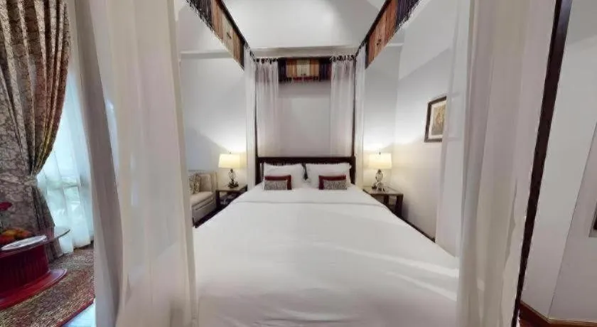 Bed in Baan Klang Wiang Hotel