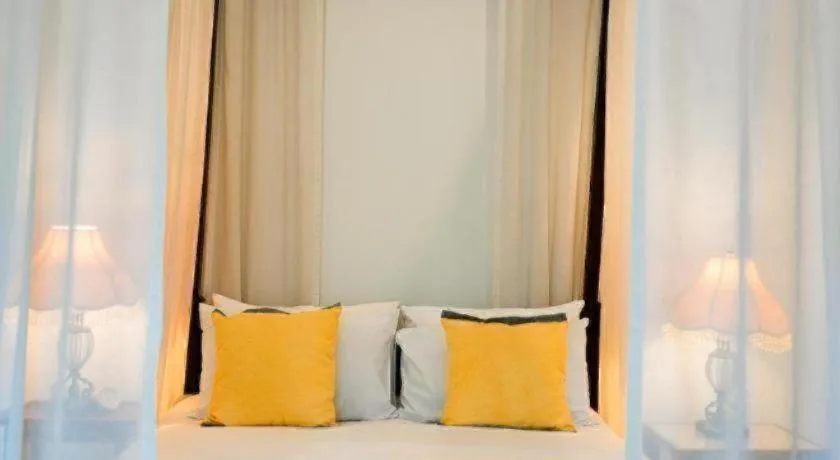 Bed in Baan Klang Wiang Hotel