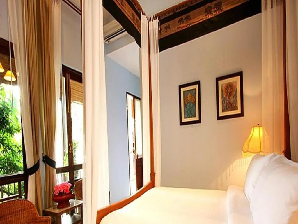 Bed in Baan Klang Wiang Hotel