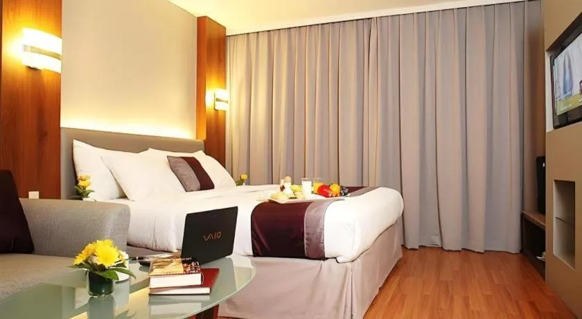Bed in Grand Cemara Hotel