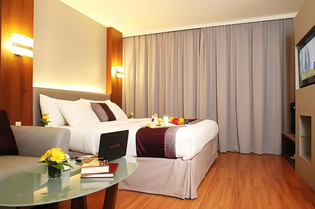 Bed in Grand Cemara Hotel
