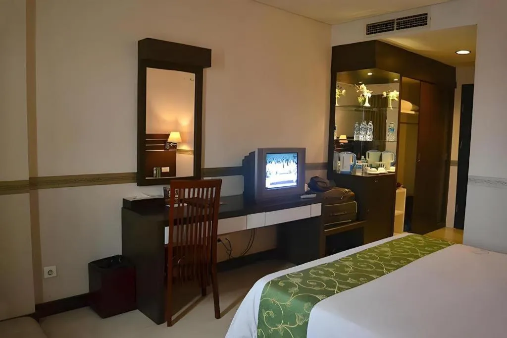 Bed in Grand Antares Hotel