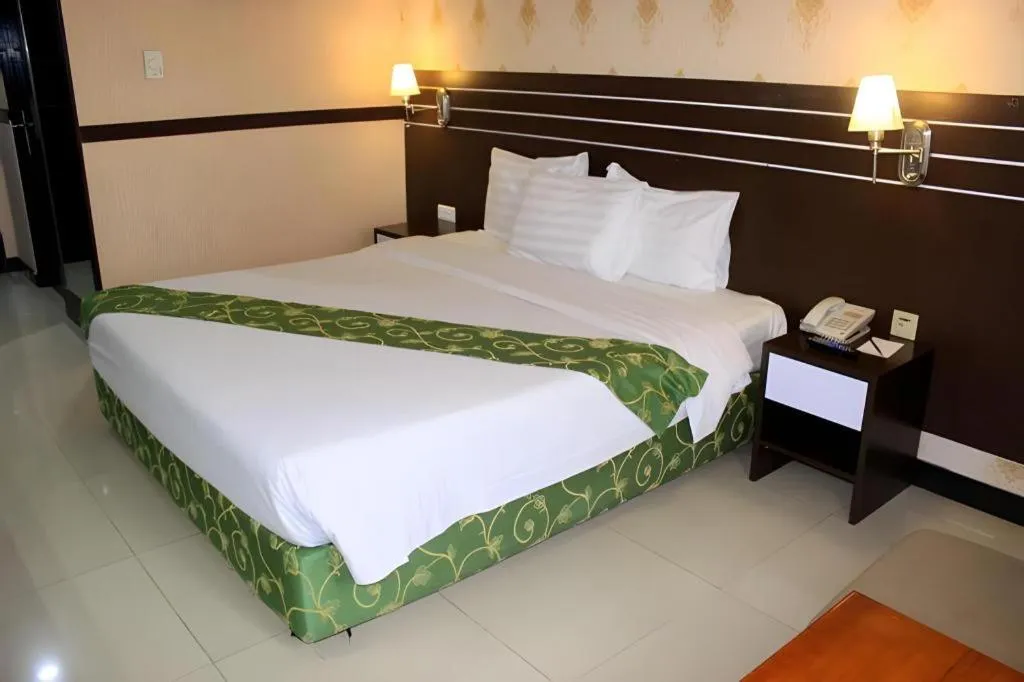 Bed in Grand Antares Hotel