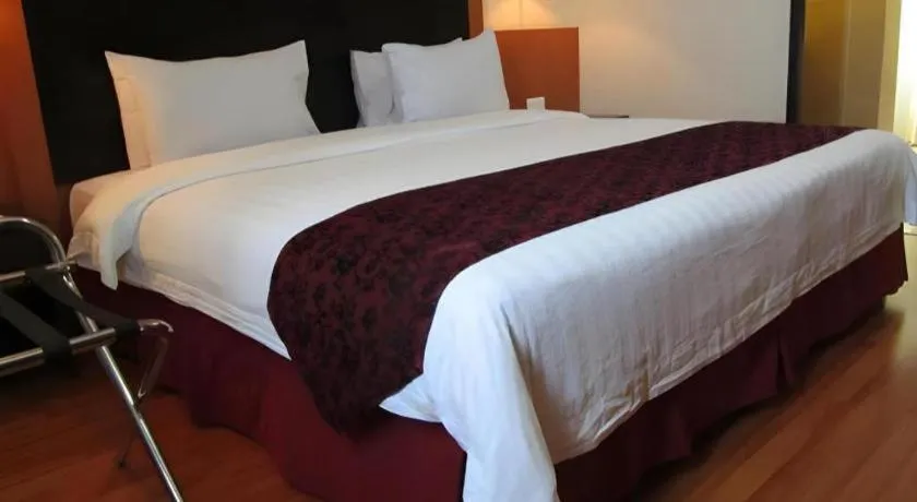 Bed in Grand Antares Hotel