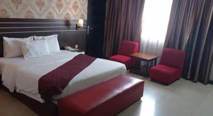 Bed in Grand Antares Hotel