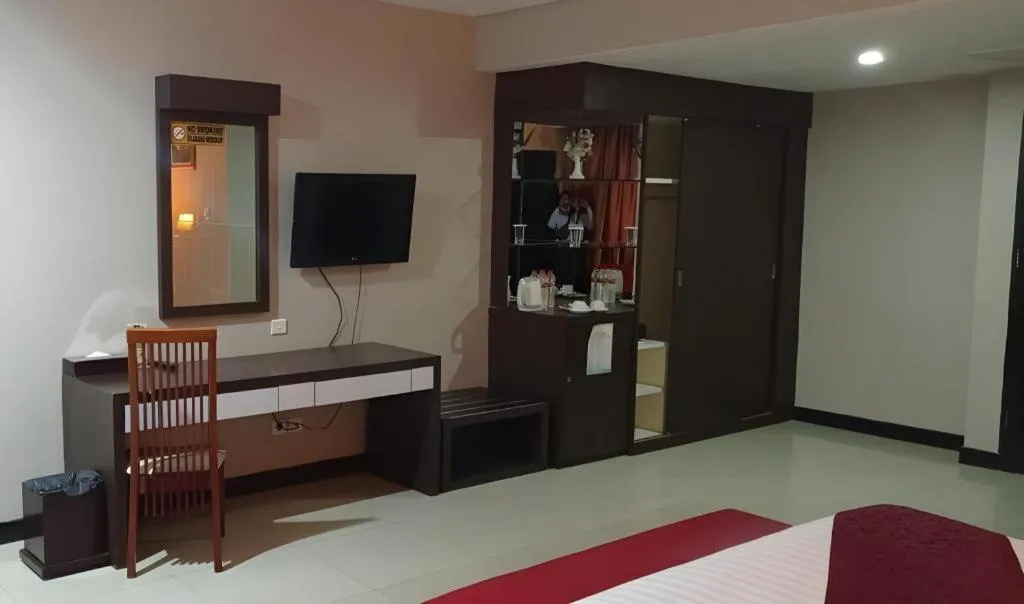 Bed in Grand Antares Hotel