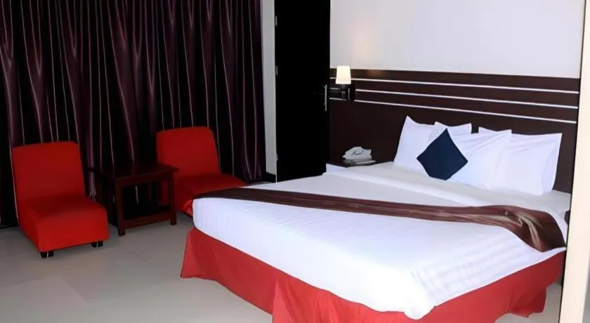 Bed in Grand Antares Hotel