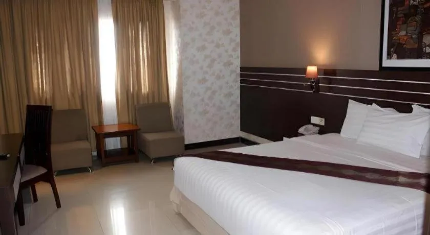 Bed in Grand Antares Hotel