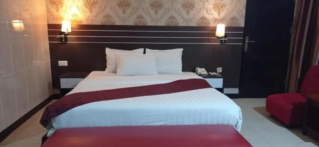 Bed in Grand Antares Hotel
