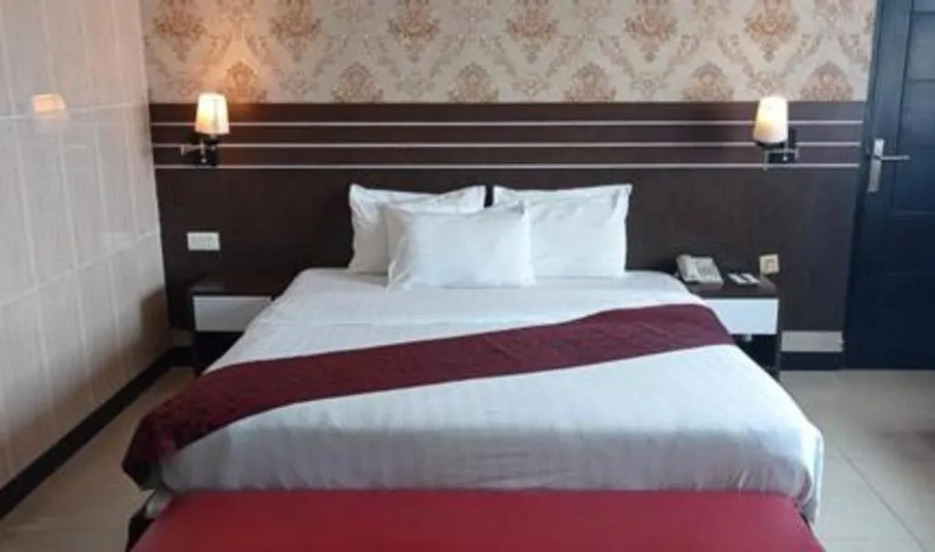 Bed in Grand Antares Hotel