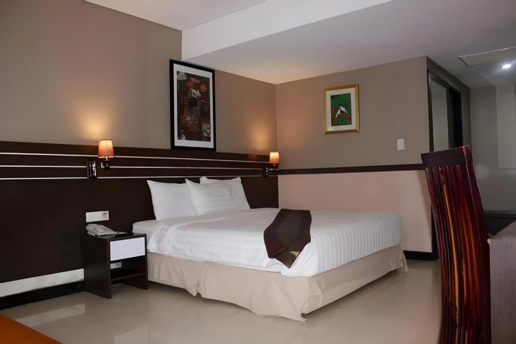 Bed in Grand Antares Hotel