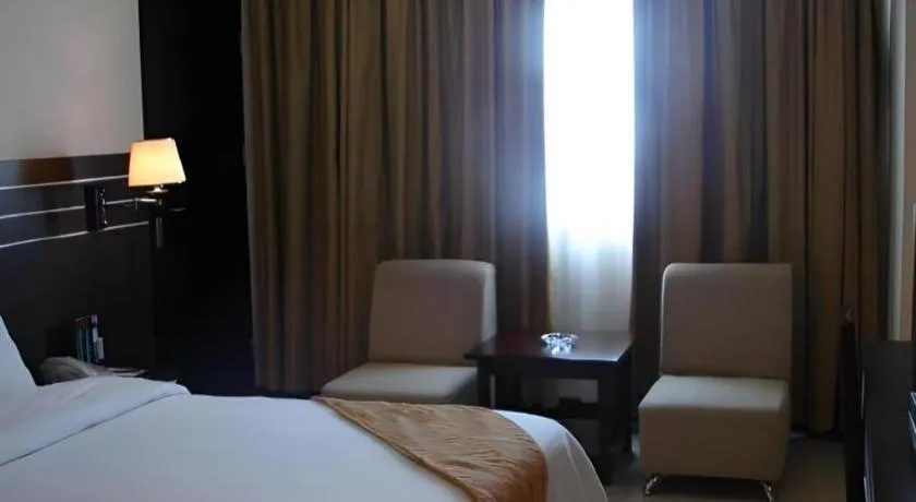 Bed in Grand Antares Hotel