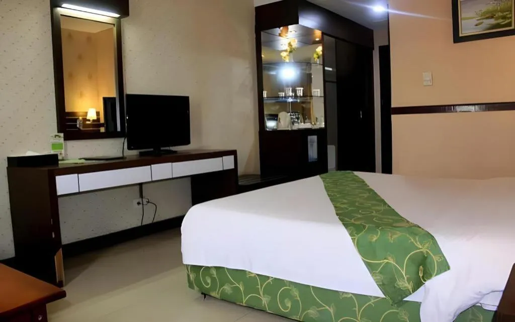 Bed in Grand Antares Hotel