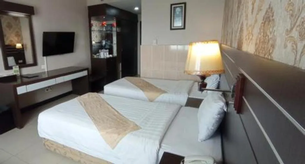 Bed in Grand Antares Hotel
