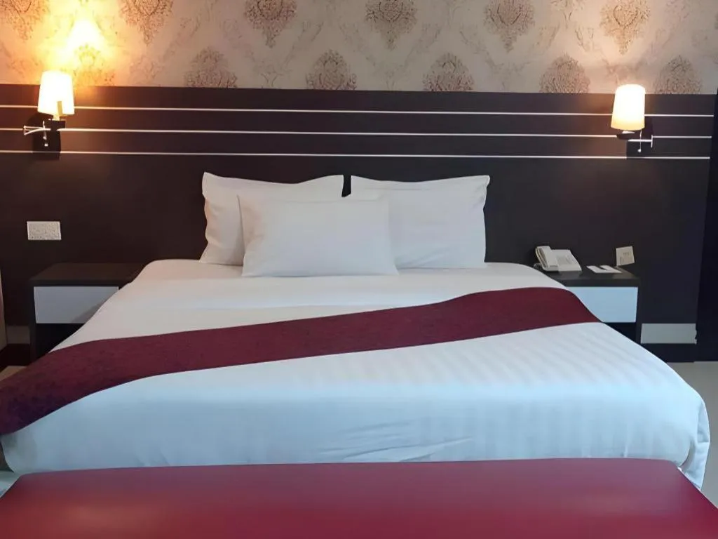 Bed in Grand Antares Hotel
