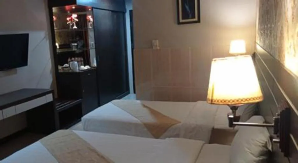 Bed in Grand Antares Hotel