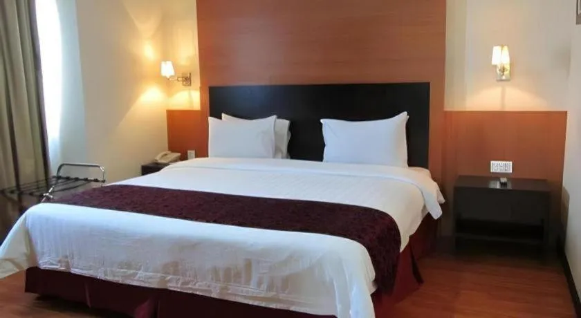 Bed in Grand Antares Hotel