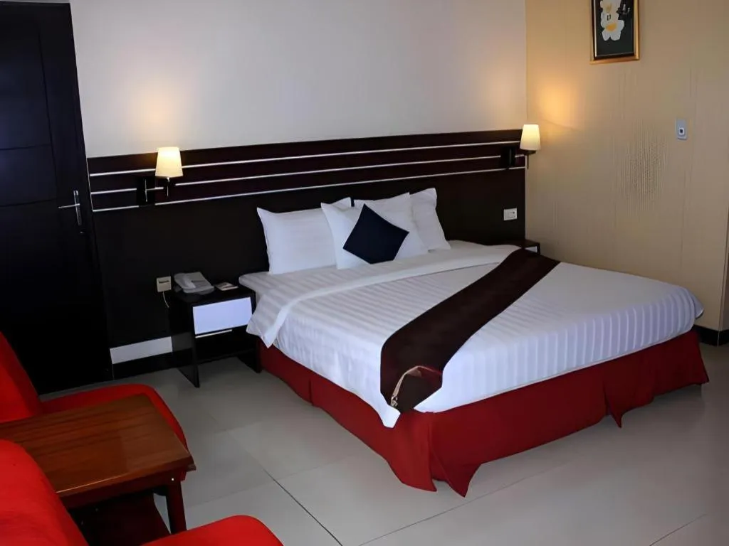 Bed in Grand Antares Hotel