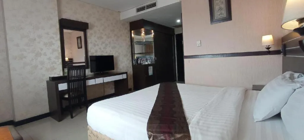 Bed in Grand Antares Hotel