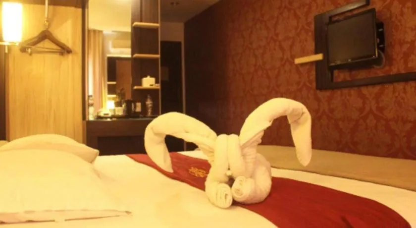 Bed in Travello Hotel Manado