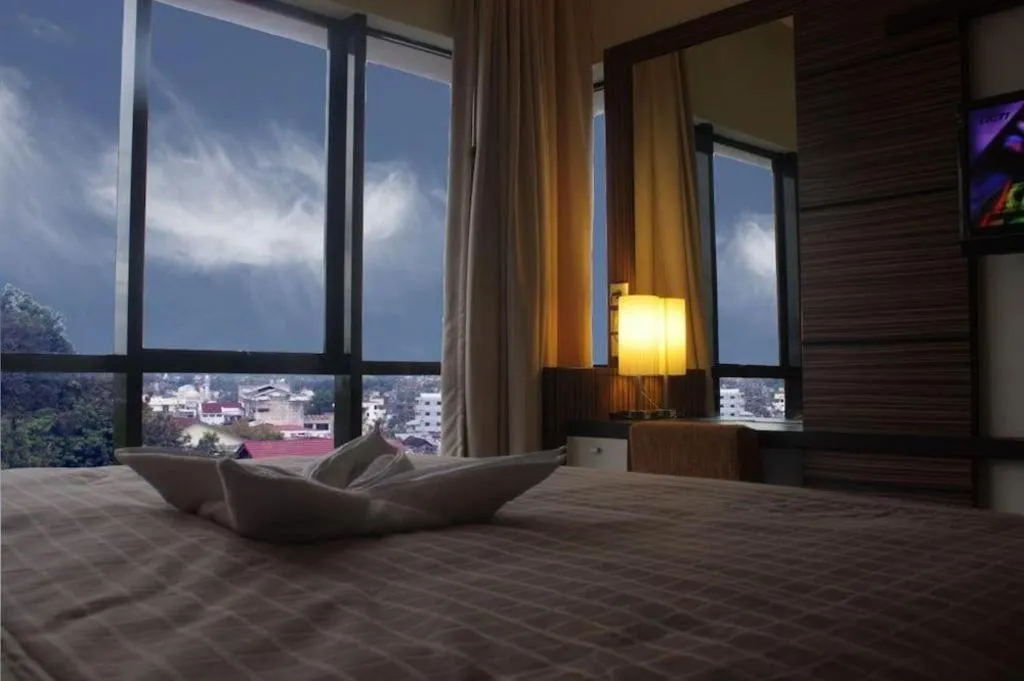 Bed in Travello Hotel Manado