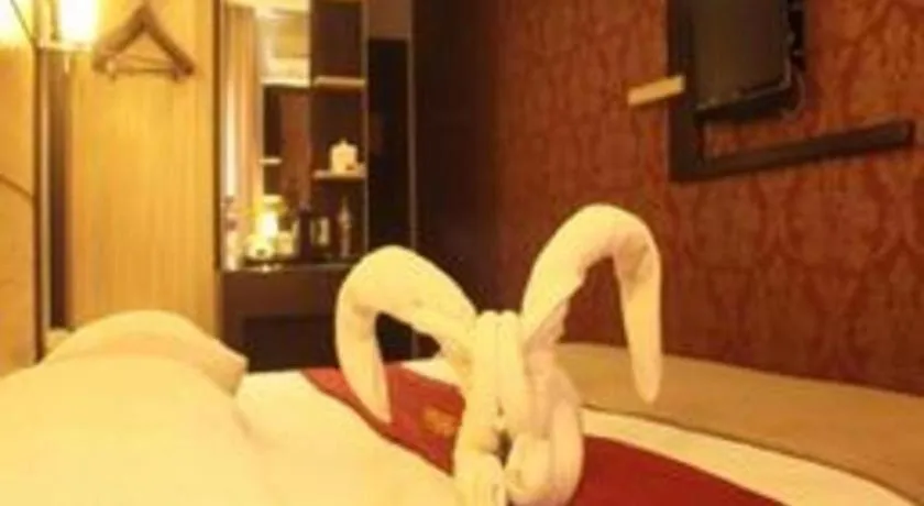 Bed in Travello Hotel Manado