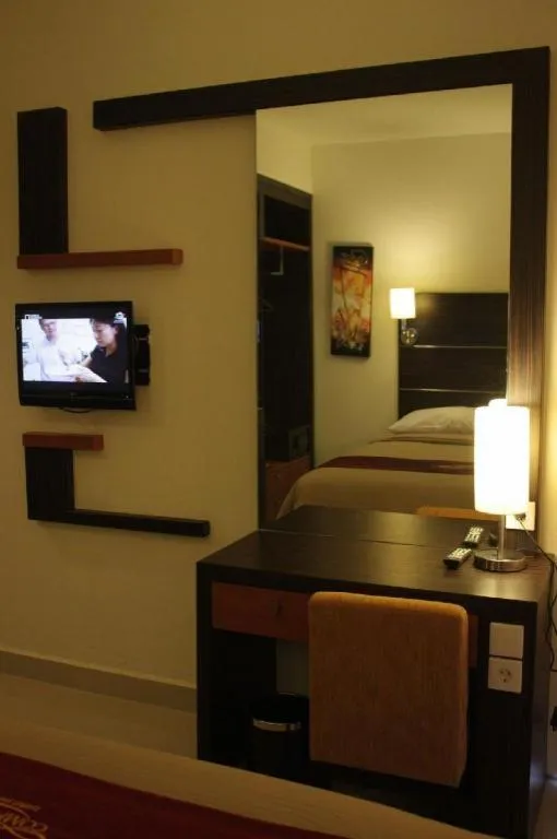 Bed in Travello Hotel Manado