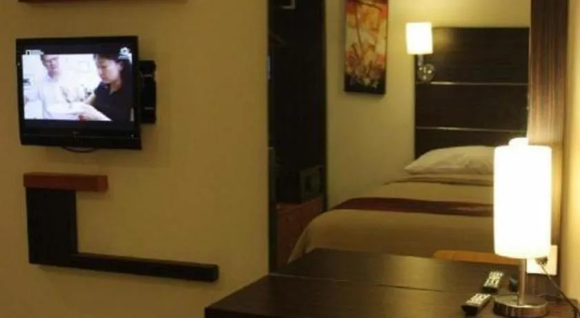 Bed in Travello Hotel Manado