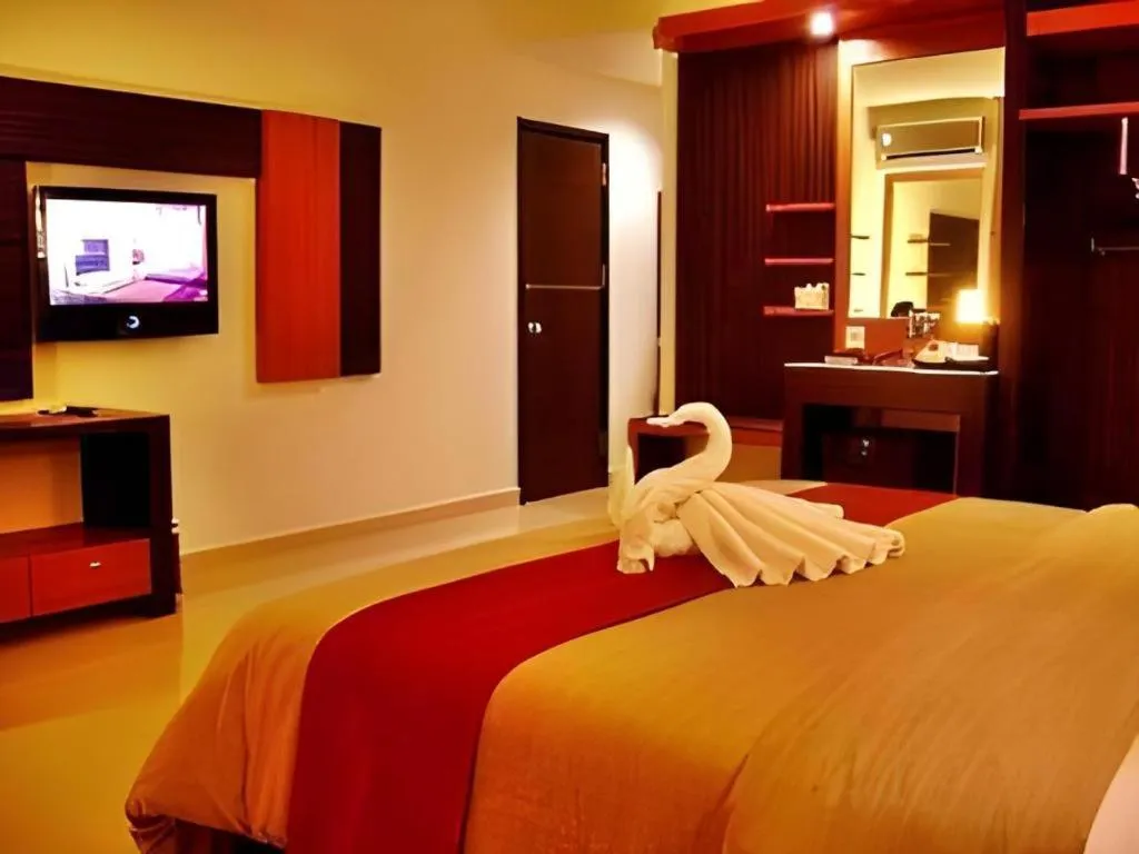 Bed in Travello Hotel Manado