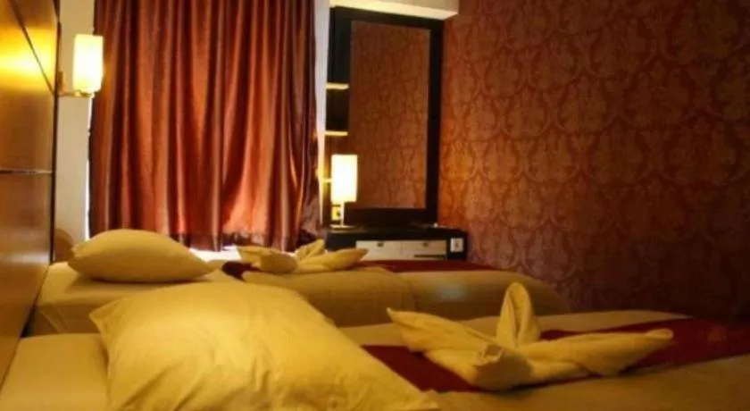 Bed in Travello Hotel Manado