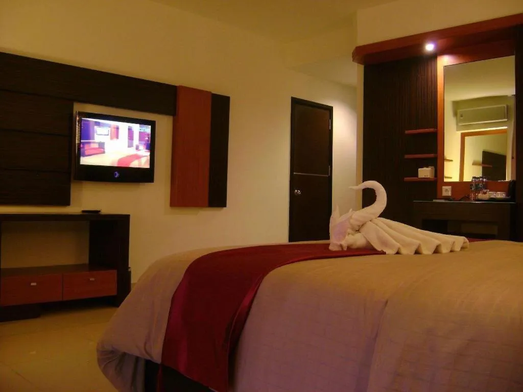 Bed in Travello Hotel Manado