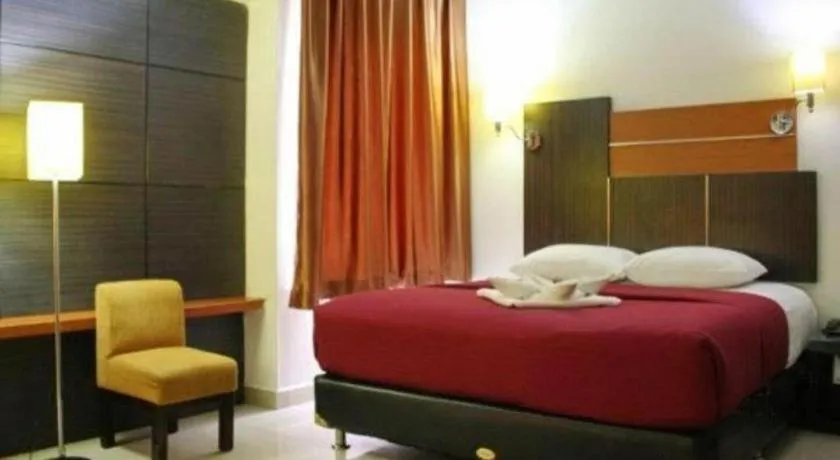 Bed in Travello Hotel Manado