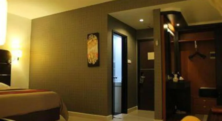 Bed in Travello Hotel Manado